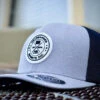 Headbanger Exclusive Flexfit Snapback Hat: Silver With White Circle Badge